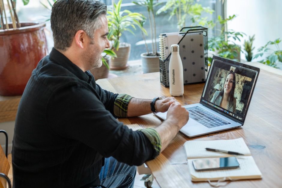 Patient at home in a video appointment with an online psychiatrist that takes insurance